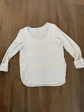 Lilly Pulitzer Cream Scoop Neck top with Gold Logo. Long sleeves.